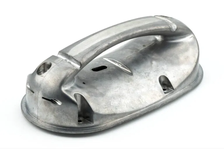 Ergonomic medical device handle manufactured via high-pressure aluminum die casting with smooth surface finishing for easy sterilization.