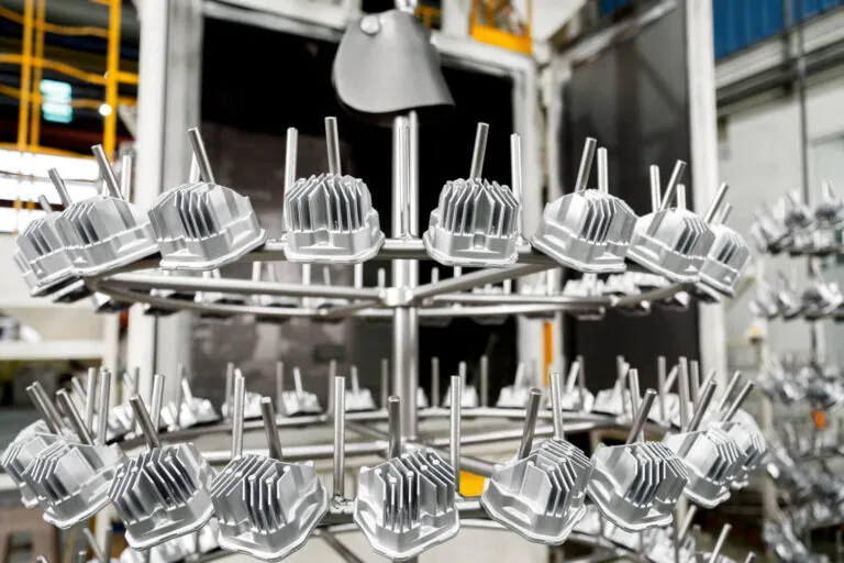 Automated shot blasting system at JoinCast’s Taiwan facility providing uniform surface texturing and scale removal for mass-produced aluminum components